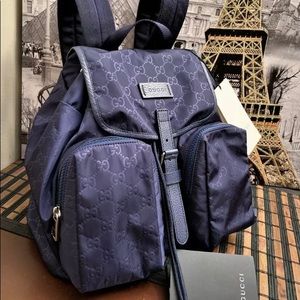 100% Authentic Gucci nylon backpack.